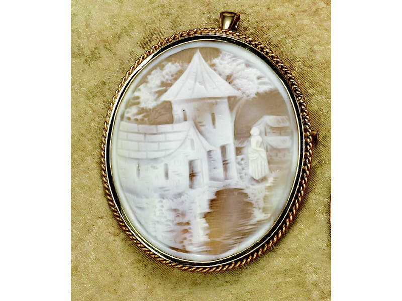 Appraisal: CAMEO PENDANT BROOCH Oval cameo brooch depicting a village scene