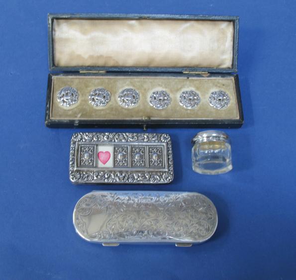 Appraisal: A GLASSES CASE of oval form the body chased with