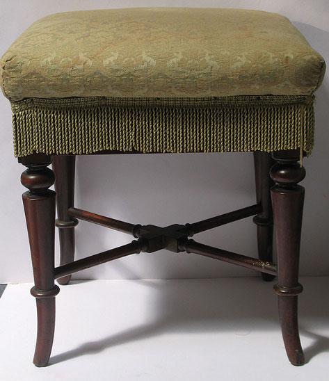 Appraisal: A VICTORIAN MAHOGANY STOOL with upholstered seat with tasseled fringe