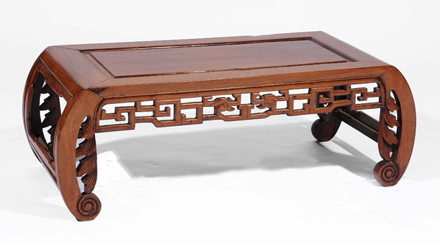 Appraisal: A Chinese hardwood kang table th th Centurywith carved frieze