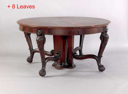 Appraisal: Victorian carved mahogany dining table th c the legs with