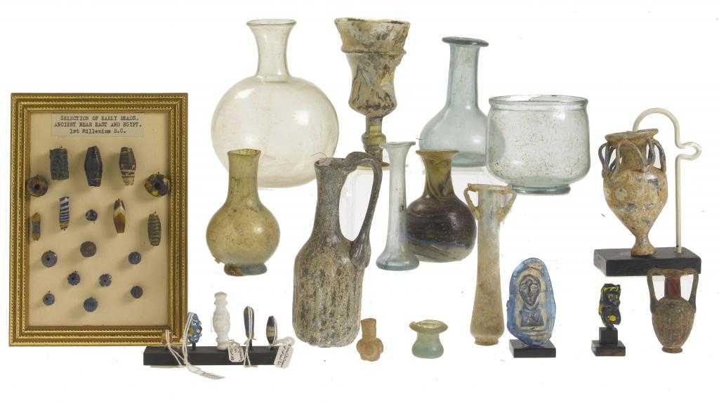 Appraisal: A SMALL COLLECTION OF ROMAN AND OTHER ANCIENT GLASS EASTERN