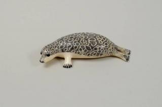 Appraisal: Inuit Scrimshaw Walrus Ivory Leopard Seal Inuit scrimshaw walrus ivory