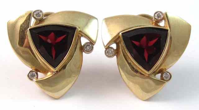 Appraisal: PAIR OF GARNET AND DIAMOND EARRINGS each k yellow gold