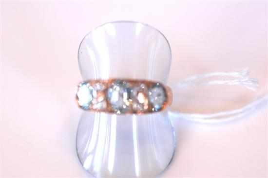 Appraisal: AN AQUAMARINE AND DIAMOND DRESS RING IN CT ROSE GOLD