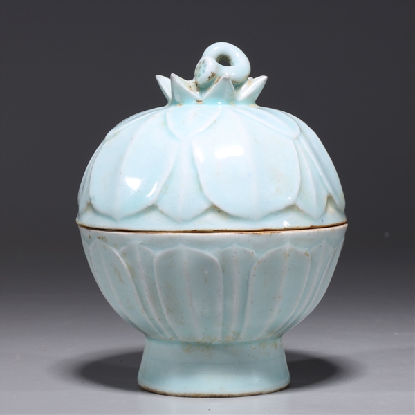 Appraisal: Unusual Chinese celadon glazed covered teapot with molded designs to