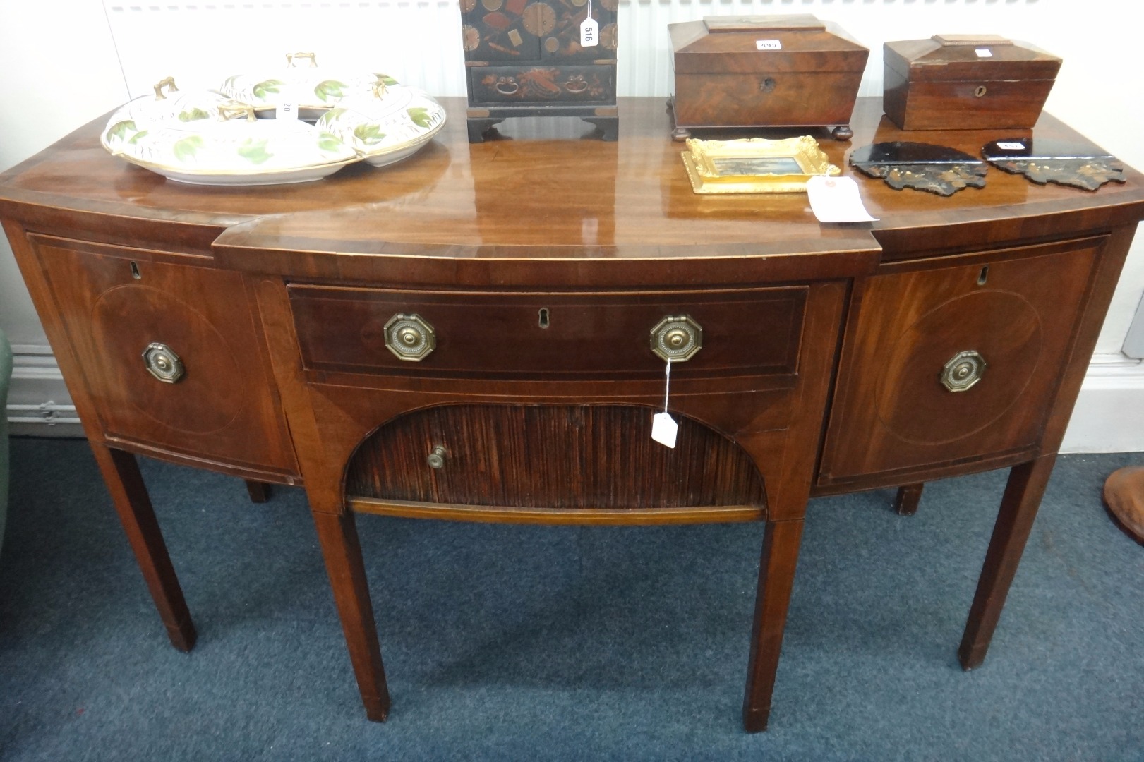 Appraisal: A George III mahogany break bowfront sideboard crossbanded and boxwood