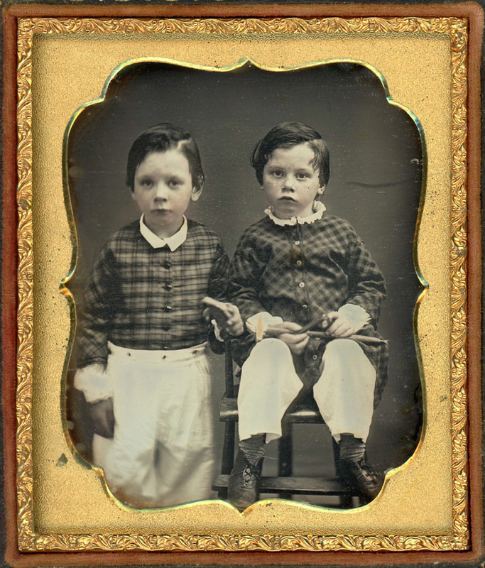 Appraisal: FOUR DAGUERREOTYPES OF CHILDREN WITH PROPS Two boys dressed alike