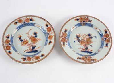 Appraisal: A pair of Imari plates th Century painted with chrysanthemums