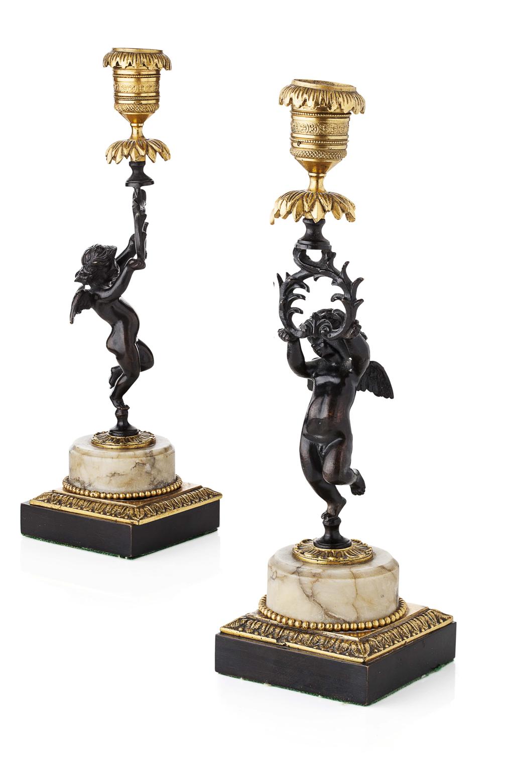 Appraisal: PAIR OF FRENCH GILT AND PATINATED BRONZE FIGURAL CANDLESTICKS EARLY