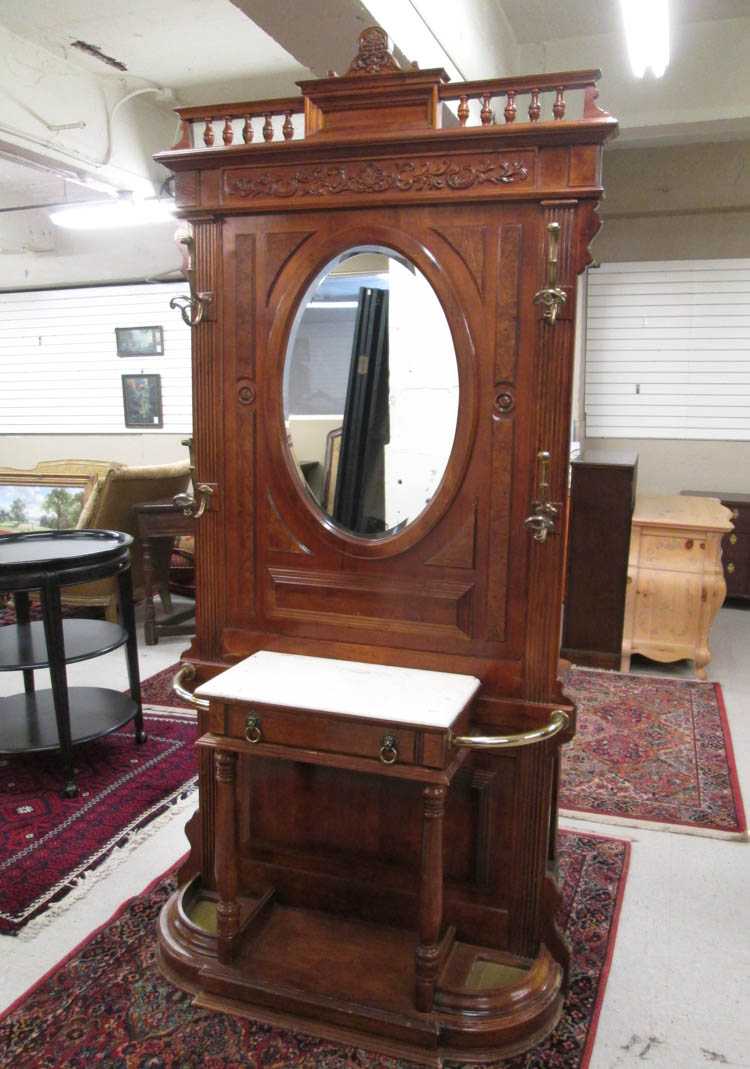 Appraisal: ANTIQUE REPRODUCTION HALLSTAND unknown American maker the upper portion centering