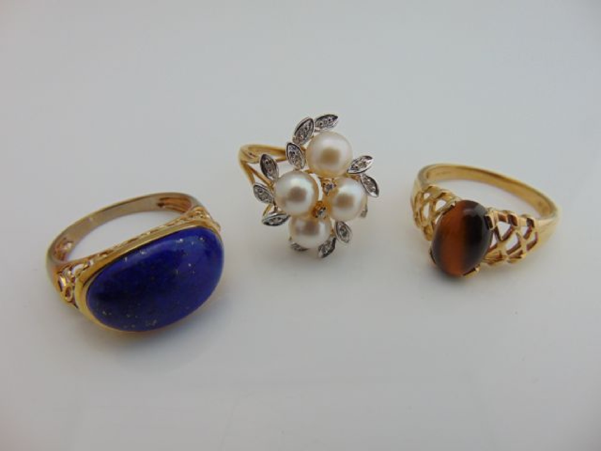 Appraisal: A lapis-lazuli ring with pierced gallery in ct gold size