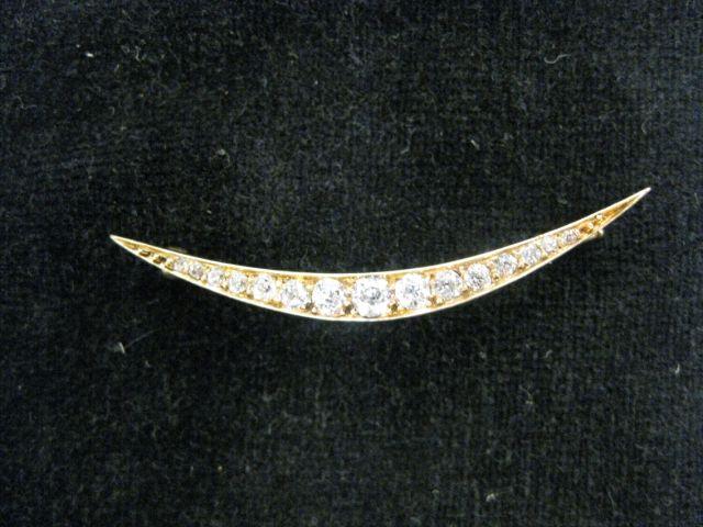 Appraisal: Diamond Cresent Brooch antique with carats k yellow gold with