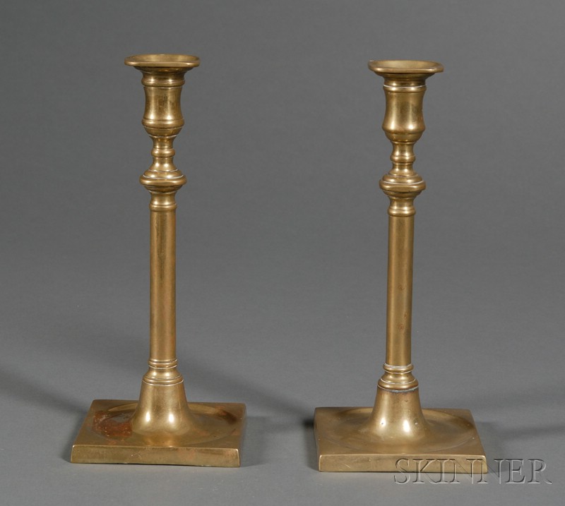 Appraisal: Pair of Brass Candlesticks with Square Dished Bases mid- th