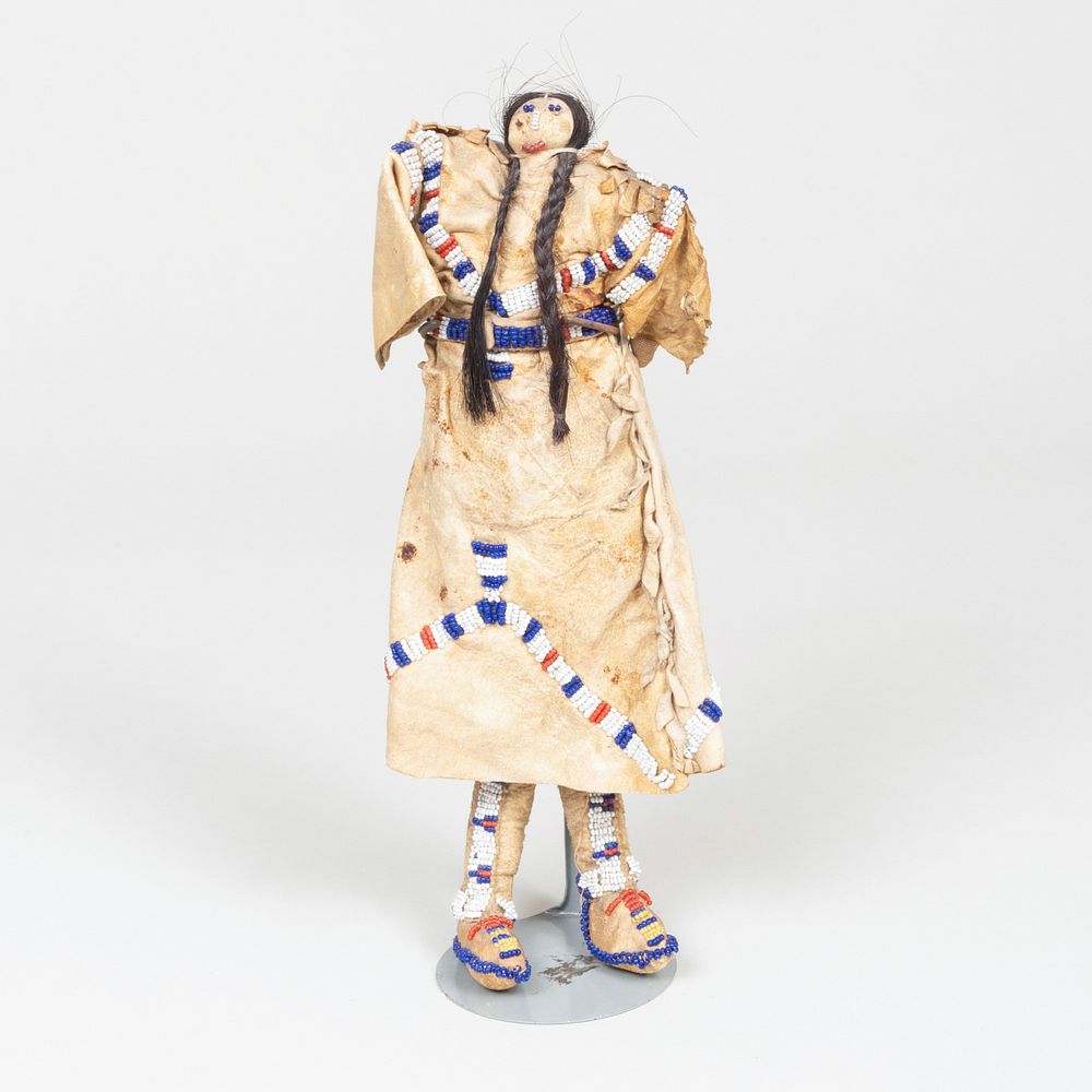 Appraisal: Plains Beaded and Hide Doll Raised on a metal stand