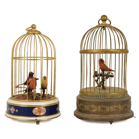 Appraisal: Two Gilt-Metal Singing Birdcages Estimate nbsp nbsp nbsp - nbsp