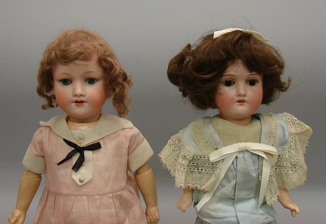 Appraisal: Pair of dolls in factory original dresses Pink dress -