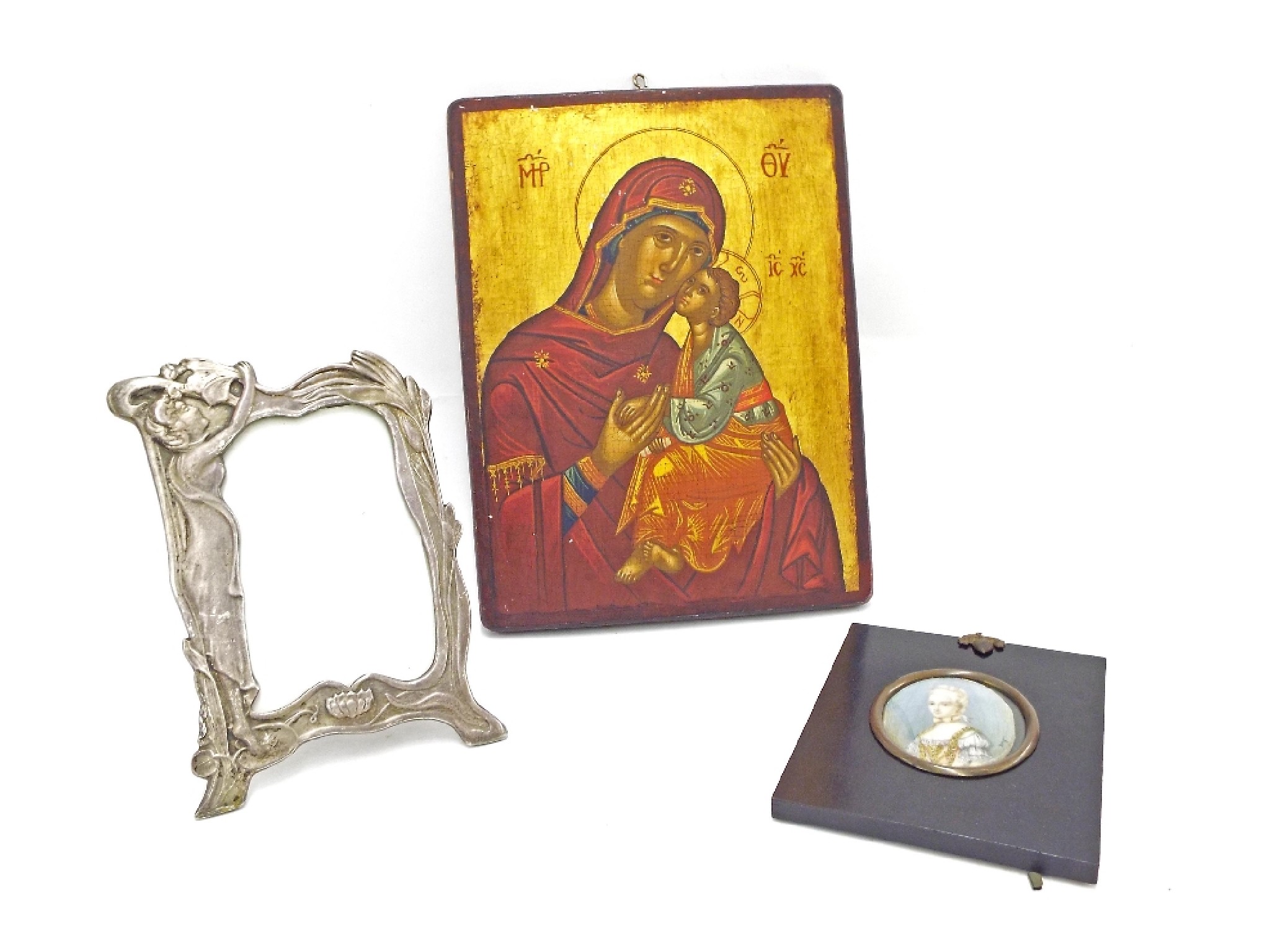 Appraisal: Russian painted icon on panel with gilded highlights x together