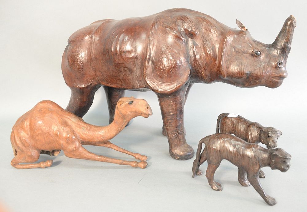 Appraisal: Four leather animals to include large rhino ht lg pair