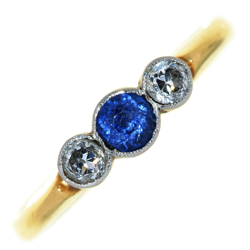 Appraisal: A sapphire and diamond ring millegrain set gold hoop marked