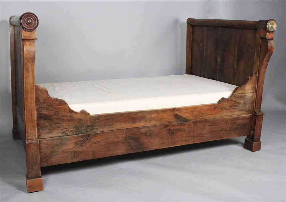 Appraisal: FRENCH EMPIRE MAHOGANY DAYBED circa the rectangular head and footboard