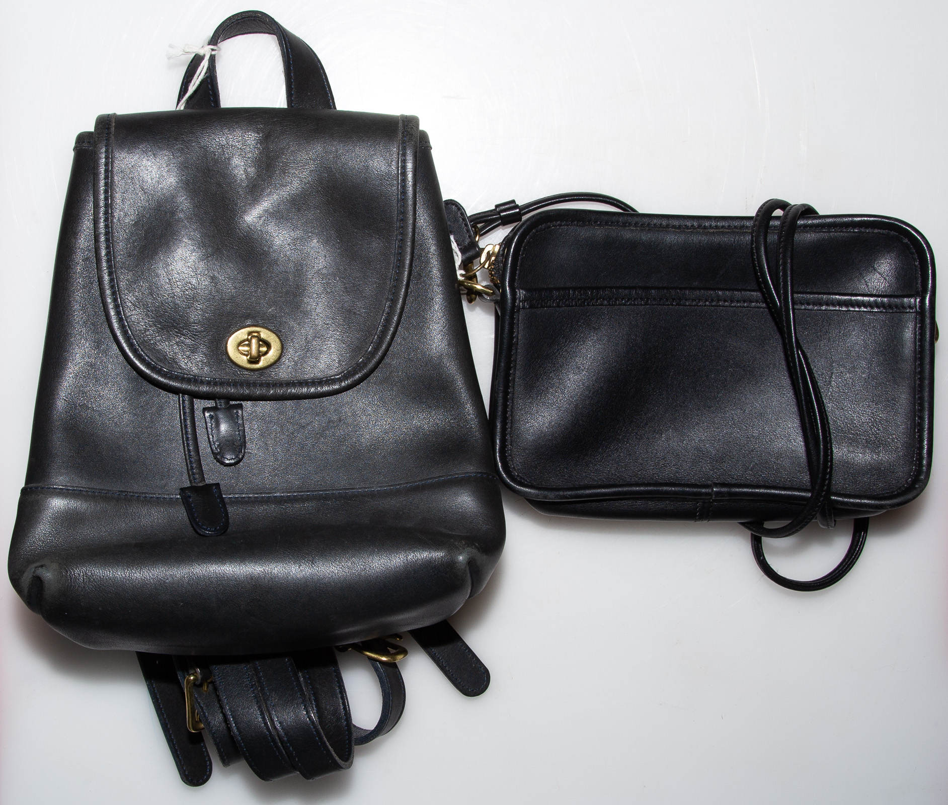 Appraisal: COACH BLACK LEATHER CROSSBODY MINI BACKPACK crossbody serial M -