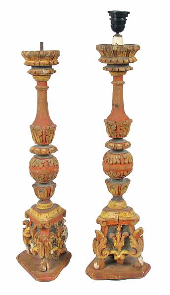 Appraisal: A pair of Italian Baroque style polychrome decorated carved walnut