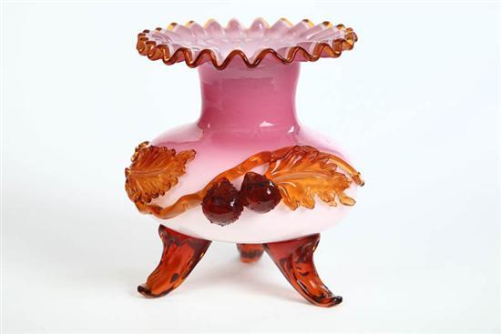 Appraisal: ART GLASS VASE Possibly Webb The pink vase has amber