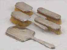 Appraisal: A five piece silver brush set comprising two hair brushes