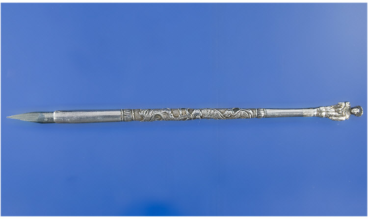 Appraisal: A White metal dip pen decorated with a chased dragon