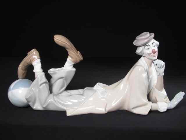 Appraisal: Lladro porcelain clown reclining with hand on chin and ball