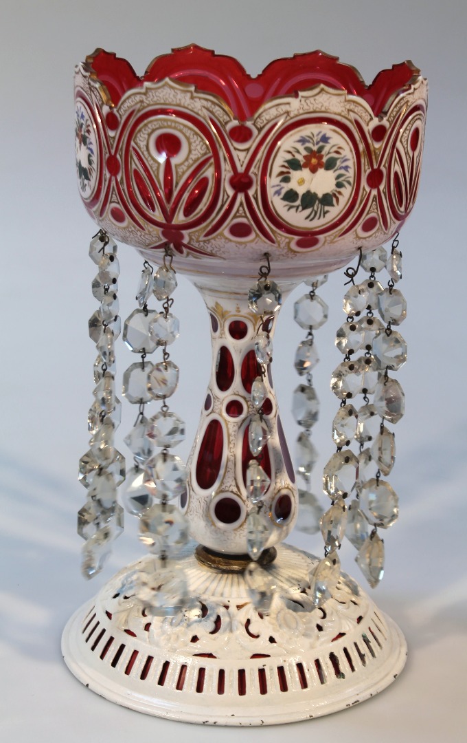 Appraisal: A late thC Bohemian ruby glass lustre with a gilt