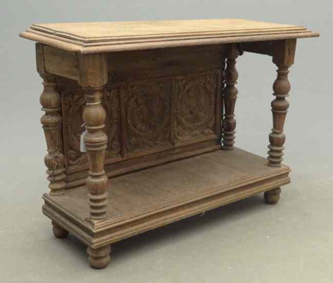 Appraisal: Early Continental oak server with carved panel Top '' x