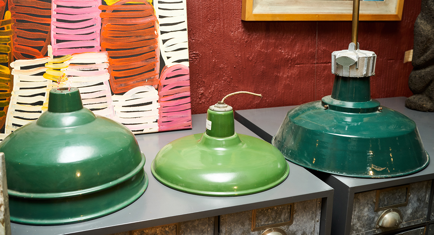 Appraisal: FOUR INDUSTRIAL ENAMELLED CEILING LIGHTS Varying sizes shades of green