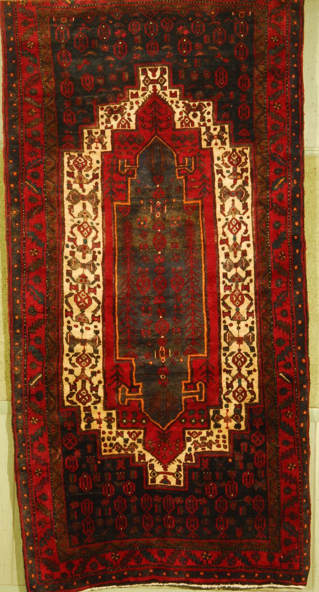 Appraisal: ORIENTAL RUG PERSIAN TRIBAL ' x ' Elongated geometric medallions