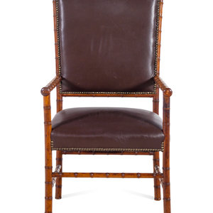 Appraisal: A Leather Upholstered Faux Bamboo Armchair Height x width x