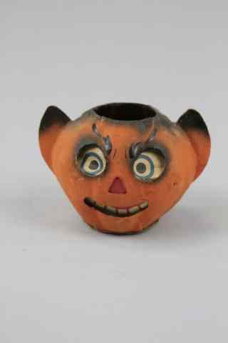 Appraisal: DEVIL EAR JACK-O-LANTERN Marked Germany a grinning paper face devil