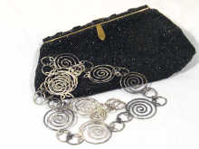 Appraisal: A beaded evening bag circa together with a white metal