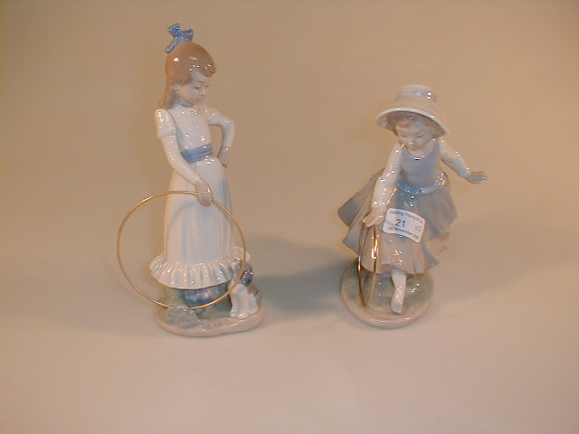 Appraisal: Two Nao by Lladro figures of girls with hoops