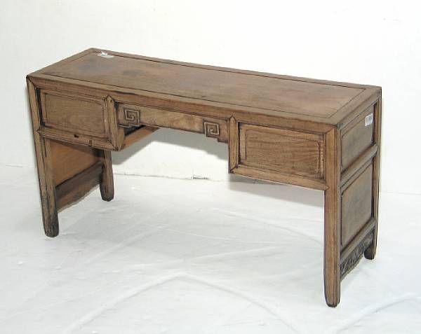 Appraisal: An export rosewood student's desk With delicately carved aprons and