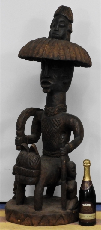 Appraisal: AFRICAN TRIBESMAN DONKEY SCARIFICATION SCULPTURE Africa th CenturyCarved wood with