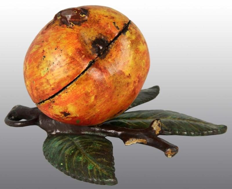 Appraisal: Cast Iron Apple Still Bank Description Manufactured by Kaiser Rex