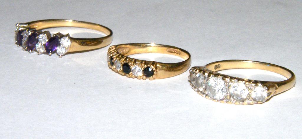 Appraisal: Three ct stone set band rings