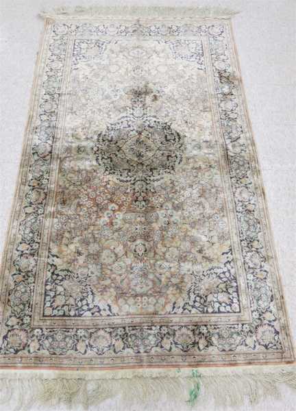 Appraisal: HAND KNOTTED ORIENTAL SILK AREA RUG Indo-Persian faded floral and