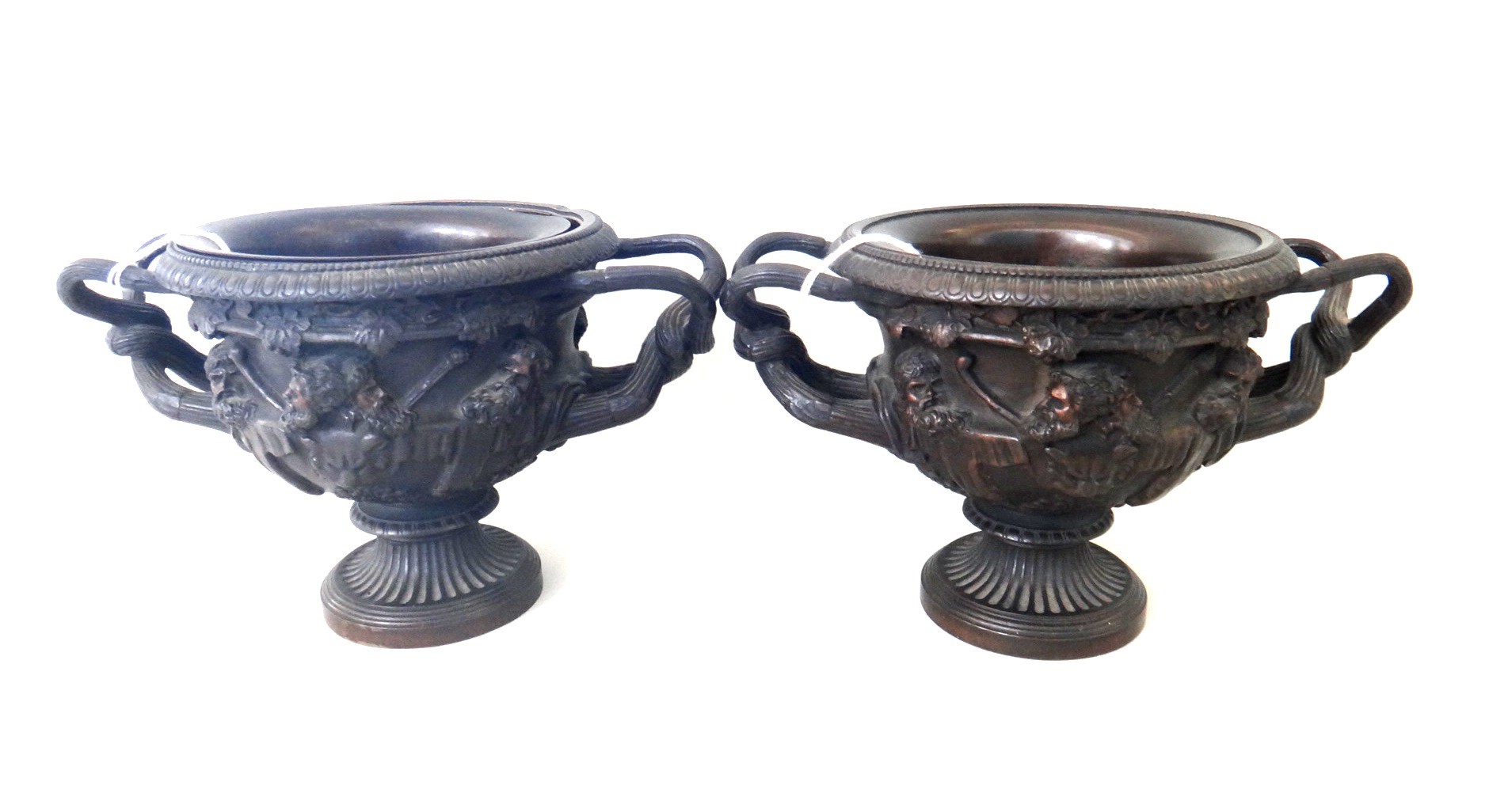 Appraisal: A pair of French bronze Warwick vases late th century