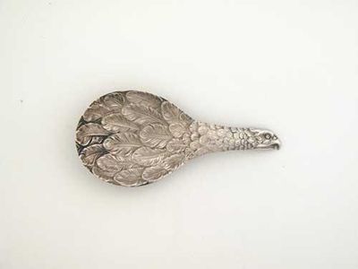 Appraisal: A rare George III stamped 'eagles wing' caddy spoon by