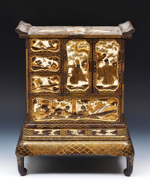 Appraisal: An ivory and lacquer Japanese kodansu small cabinet Meiji perioddecorated