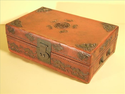 Appraisal: CHINESE LACQUERED PIGSKIN BOX Of rectangular shape and covered in