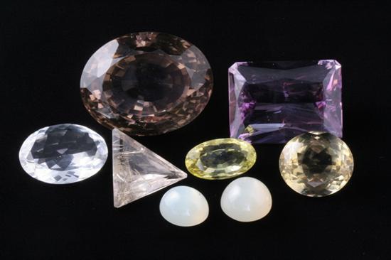 Appraisal: EIGHT UNMOUNTED GEMSTONES Scissors-cut rectangular amethyst oval moonstone cabochon round