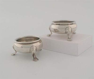 Appraisal: A pair of George II squat circular salts on three